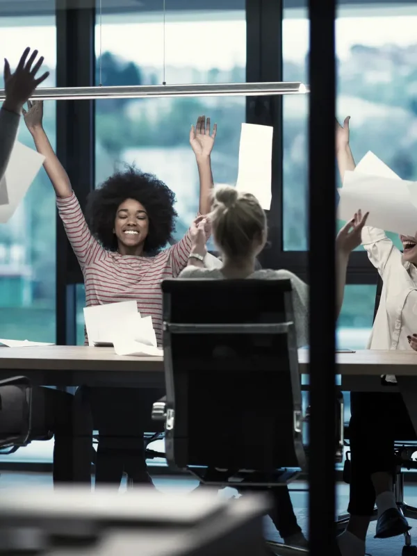 multiethnic-group-of-young-business-people-throwing-documents